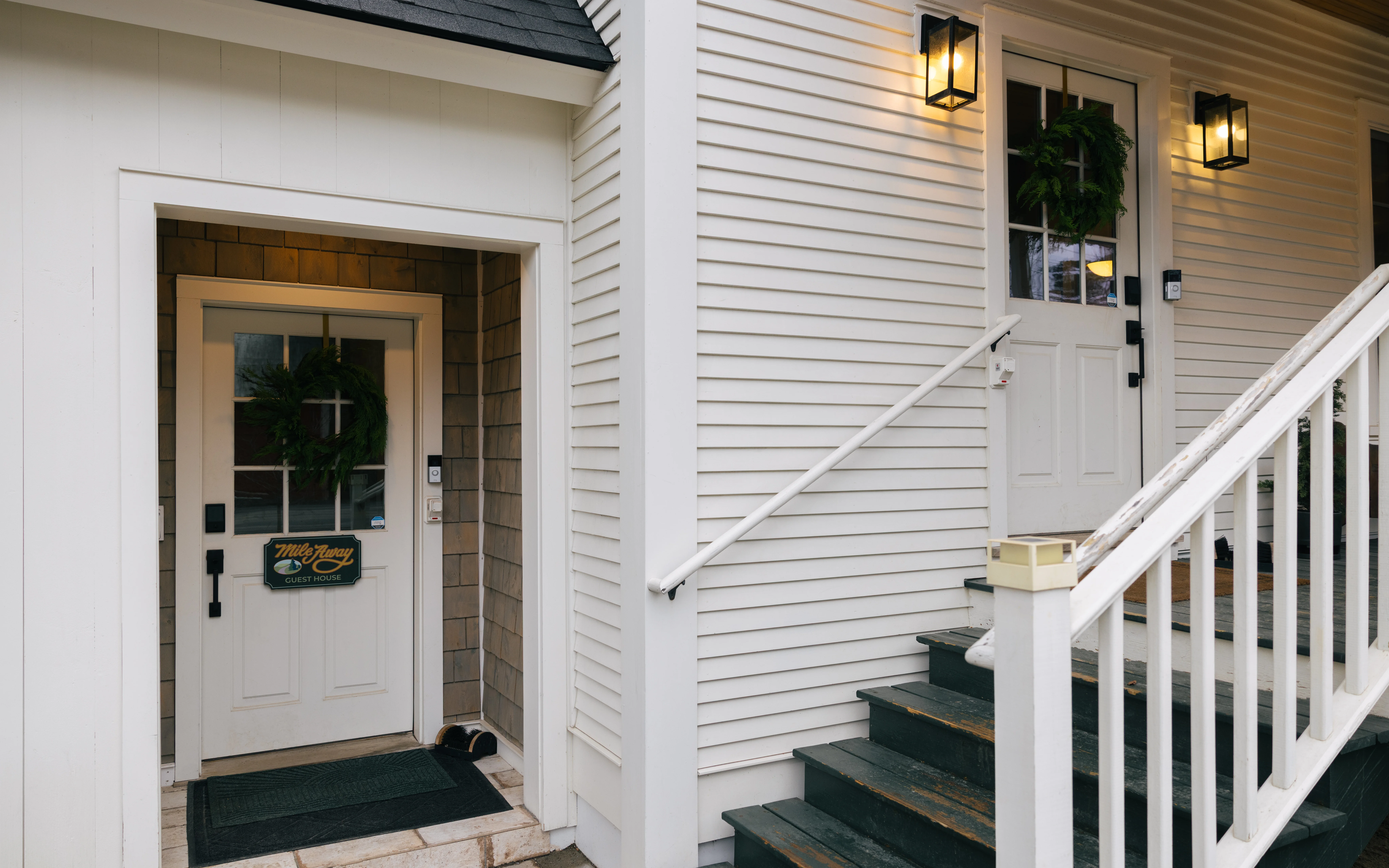 Front entrance of the Mile Away farmhouse with welcoming entryway details